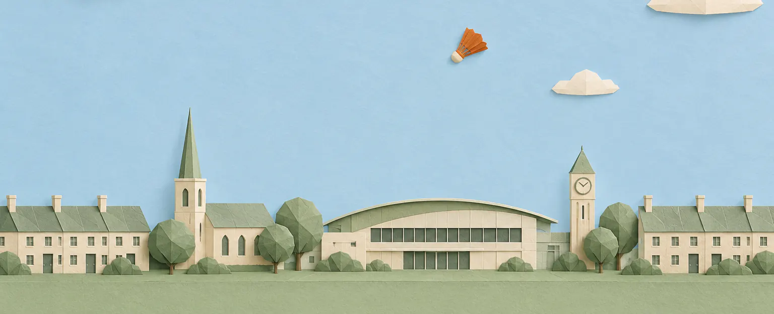 A paper-craft British town with a leisure centre, a church spire and terraced houses under a pale blue sky
